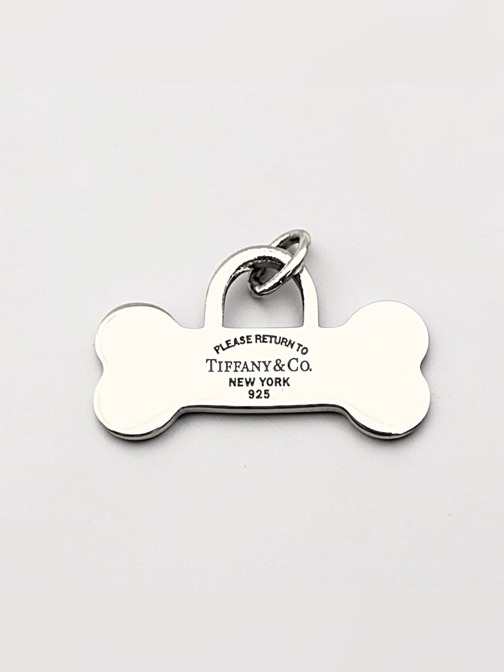 Tiffany & Co. 925 Sterling Silver Return to Tiffany Dog Bone Pendant Charm